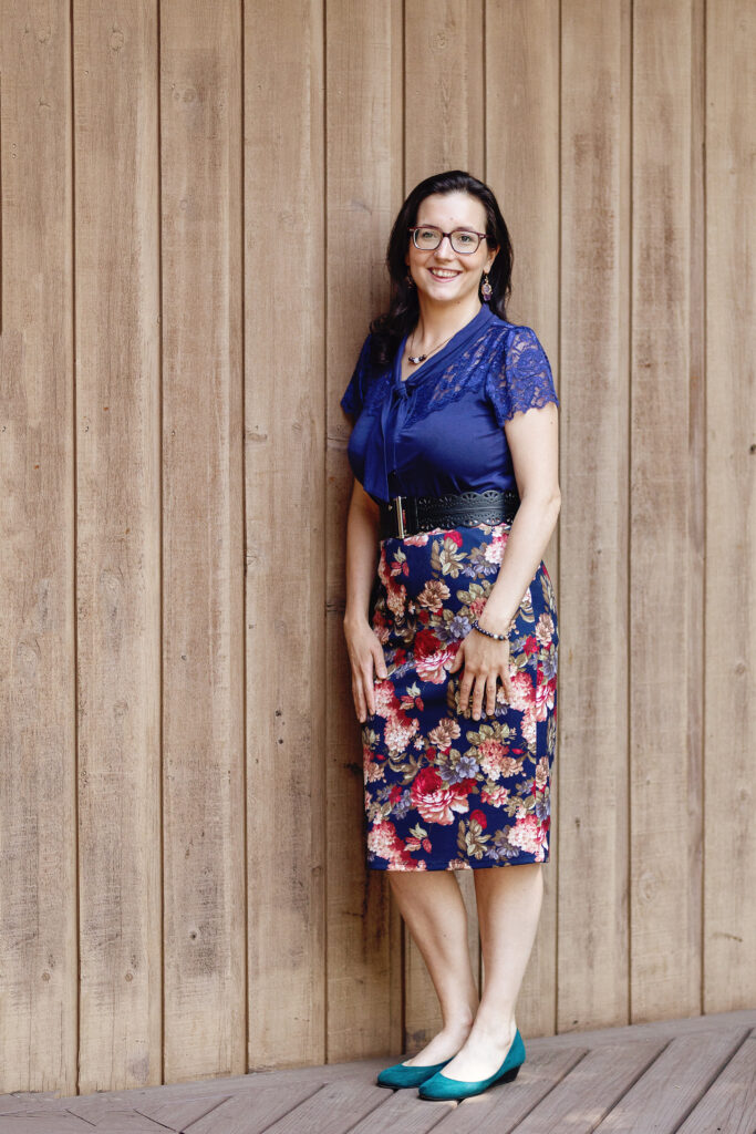 Erin Hollon, a CEO, reiki healer, life + business coach, and wellness educator.