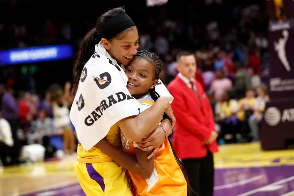 Candace Parker with Daughter photo from Forbes featured on Momma Has Goals, Athlete Moms of Influence